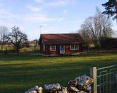 Timber cottage on land